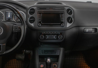 Подержанный автомобиль Volkswagen Tiguan 2014 года (14 фото)