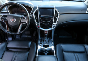 Подержанный автомобиль Cadillac SRX 2014 года (13 фото)