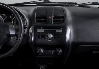 Подержанный автомобиль Suzuki SX4 Sedan 2010 года (13 фото)