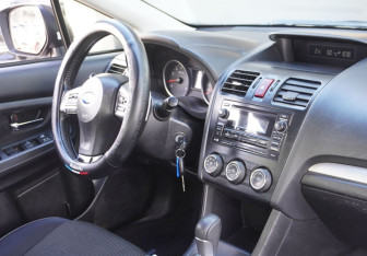 Подержанный автомобиль Subaru XV 2014 года (9 фото)