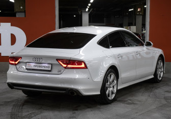 Подержанный автомобиль Audi A7 2014 года (5 фото)