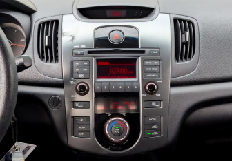 Подержанный автомобиль Kia Cerato Sedan 2012 года (15 фото)