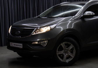 Подержанный автомобиль Kia Sportage 2012 года (19 фото)