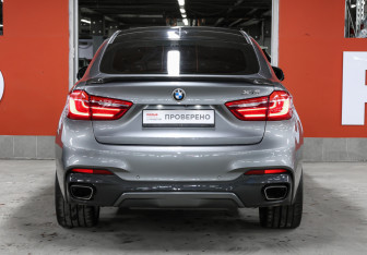 Подержанный автомобиль BMW X6 2017 года (6 фото)