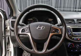 Подержанный автомобиль Hyundai Solaris Sedan 2014 года (17 фото)