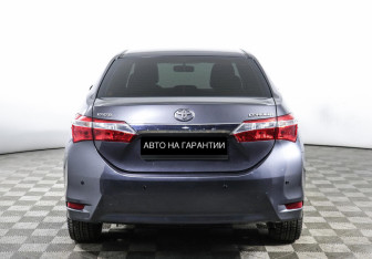 Подержанный автомобиль Toyota Corolla Sedan 2015 года (4 фото)