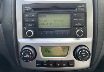 Подержанный автомобиль Kia Sportage 2010 года (14 фото)