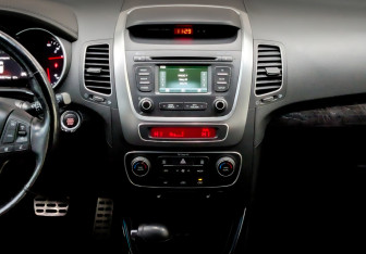 Подержанный автомобиль Kia Sorento 2014 года (15 фото)