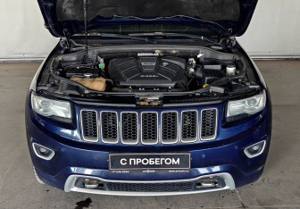 Подержанный автомобиль Jeep Grand Cherokee 2014 года (18 фото)