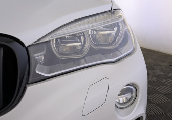 Подержанный автомобиль BMW X6 2016 года (11 фото)