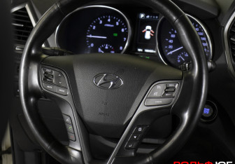 Подержанный автомобиль Hyundai Santa Fe 2015 года (15 фото)