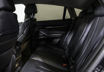 Подержанный автомобиль BMW X6 2016 года (13 фото)