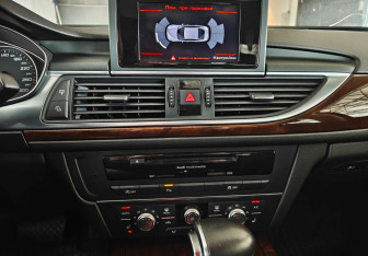 Подержанный автомобиль Audi A6 Sedan 2014 года (13 фото)