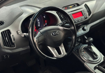 Подержанный автомобиль Kia Sportage 2014 года (12 фото)