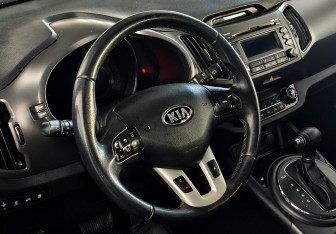 Подержанный автомобиль Kia Sportage 2013 года (11 фото)