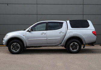 Подержанный автомобиль Mitsubishi L200 2011 года (8 фото)