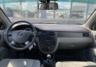 Подержанный автомобиль Daewoo Gentra Sedan 2014 года (11 фото)
