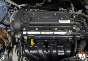 Подержанный автомобиль Kia Rio Sedan 2015 года (9 фото)