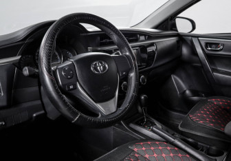 Подержанный автомобиль Toyota Corolla Sedan 2014 года (14 фото)