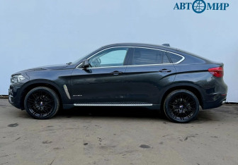 Подержанный автомобиль BMW X6 2015 года (8 фото)
