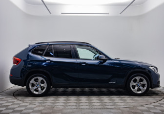Подержанный автомобиль BMW X1 2014 года (4 фото)