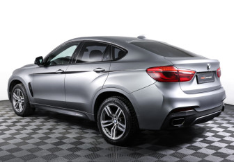 Подержанный автомобиль BMW X6 2018 года (7 фото)