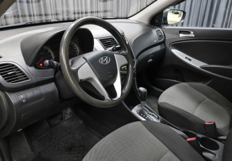 Подержанный автомобиль Hyundai Solaris Sedan 2012 года (14 фото)