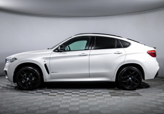 Подержанный автомобиль BMW X6 2019 года (8 фото)