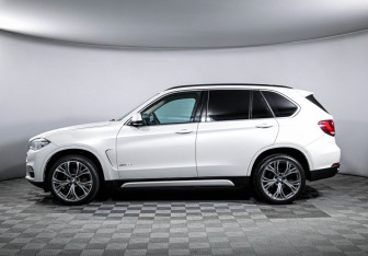 Подержанный автомобиль BMW X5 2014 года (8 фото)