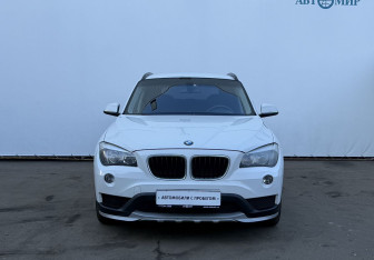 Подержанный автомобиль BMW X1 2014 года (2 фото)