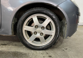 Подержанный автомобиль Mitsubishi Colt Hatchback 2006 года (15 фото)