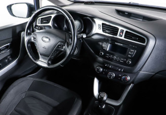 Подержанный автомобиль Kia Ceed Wagon 2014 года (13 фото)