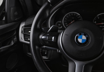 Подержанный автомобиль BMW X6 2014 года (12 фото)