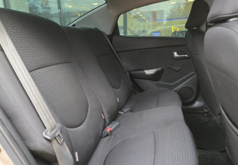 Подержанный автомобиль Kia Rio Sedan 2014 года (11 фото)
