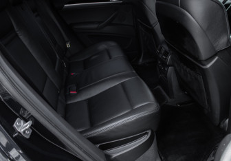Подержанный автомобиль BMW X6 M 2013 года (8 фото)