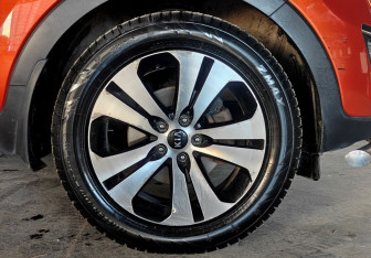 Подержанный автомобиль Kia Sportage 2013 года (19 фото)