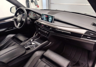 Подержанный автомобиль BMW X5 M 2015 года (15 фото)