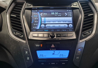 Подержанный автомобиль Hyundai Santa Fe 2013 года (14 фото)