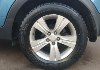 Подержанный автомобиль Kia Sportage 2010 года (13 фото)