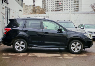 Подержанный автомобиль Subaru Forester Suv 2014 года (4 фото)