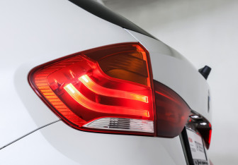 Подержанный автомобиль BMW X1 2014 года (19 фото)