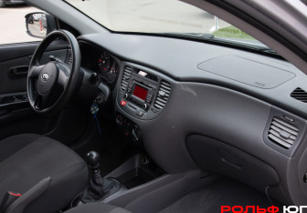 Подержанный автомобиль Kia Rio Hatchback 2010 года (7 фото)