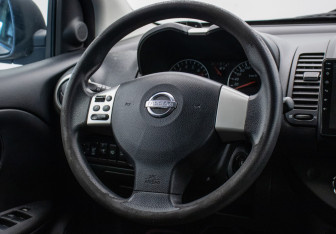 Подержанный автомобиль Nissan Note 2013 года (14 фото)