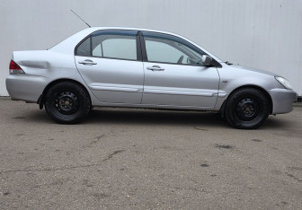 Подержанный автомобиль Mitsubishi Lancer Sedan 2009 года (4 фото)
