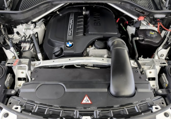 Подержанный автомобиль BMW X5 2014 года (9 фото)