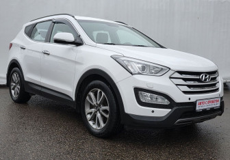 Подержанный автомобиль Hyundai Santa Fe 2014 года (3 фото)