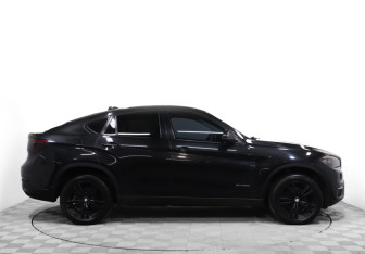 Подержанный автомобиль BMW X6 2016 года (4 фото)