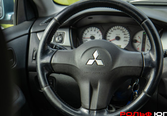 Подержанный автомобиль Mitsubishi Lancer Wagon 2007 года (11 фото)