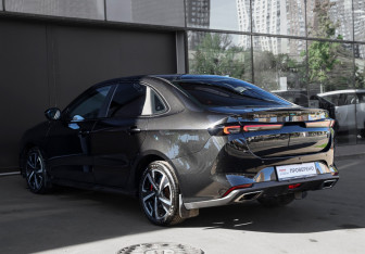 Подержанный автомобиль Kaiyi E5 2023 года (7 фото)