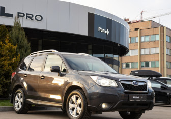 Подержанный автомобиль Subaru Forester Suv 2014 года (2 фото)